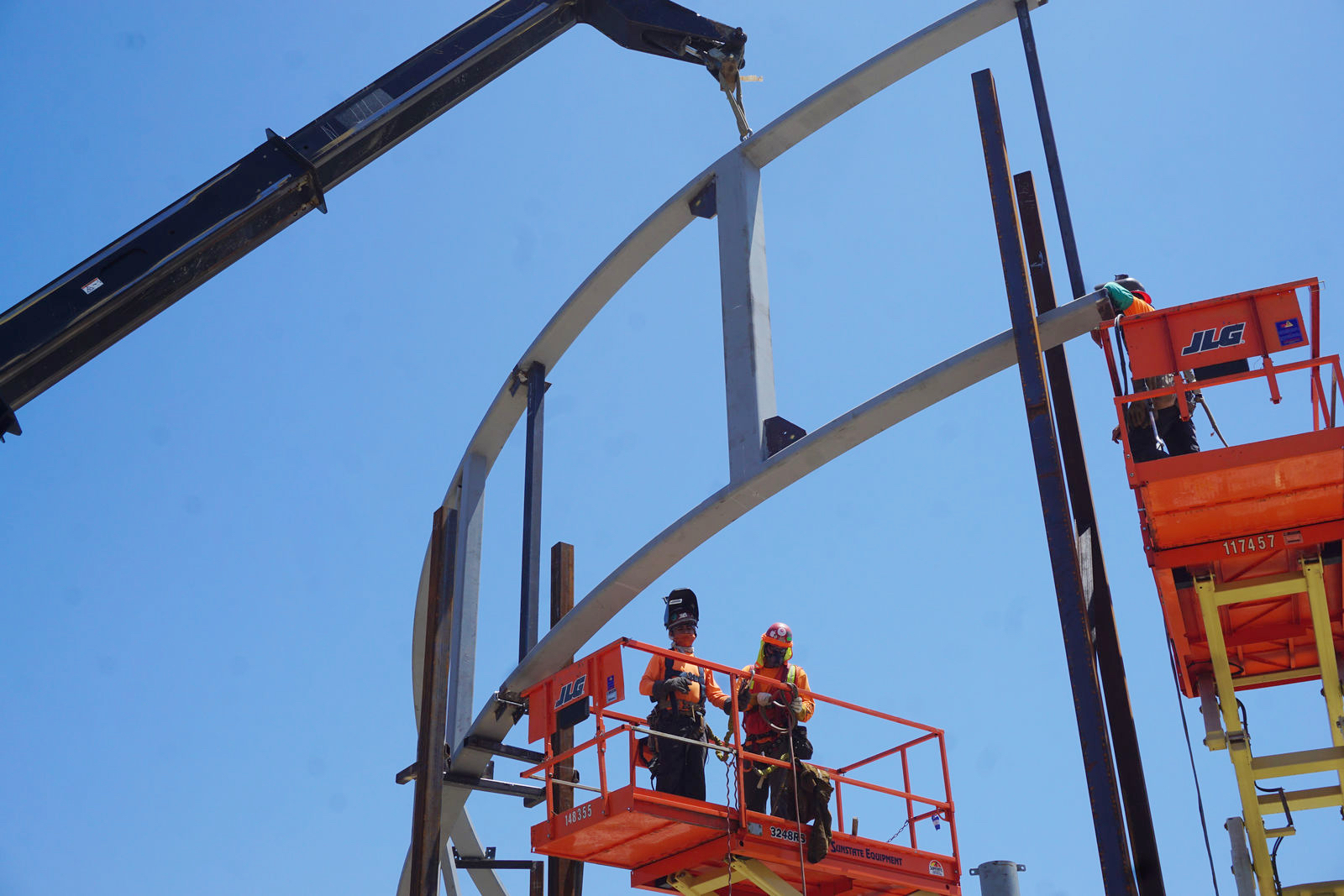 On May 5, 2020, work begins on the installation of the shrine's alpha-shaped ribbon of stainless steel. Photo courtesy Diocese of Orange. Note: Photo taken during construction.