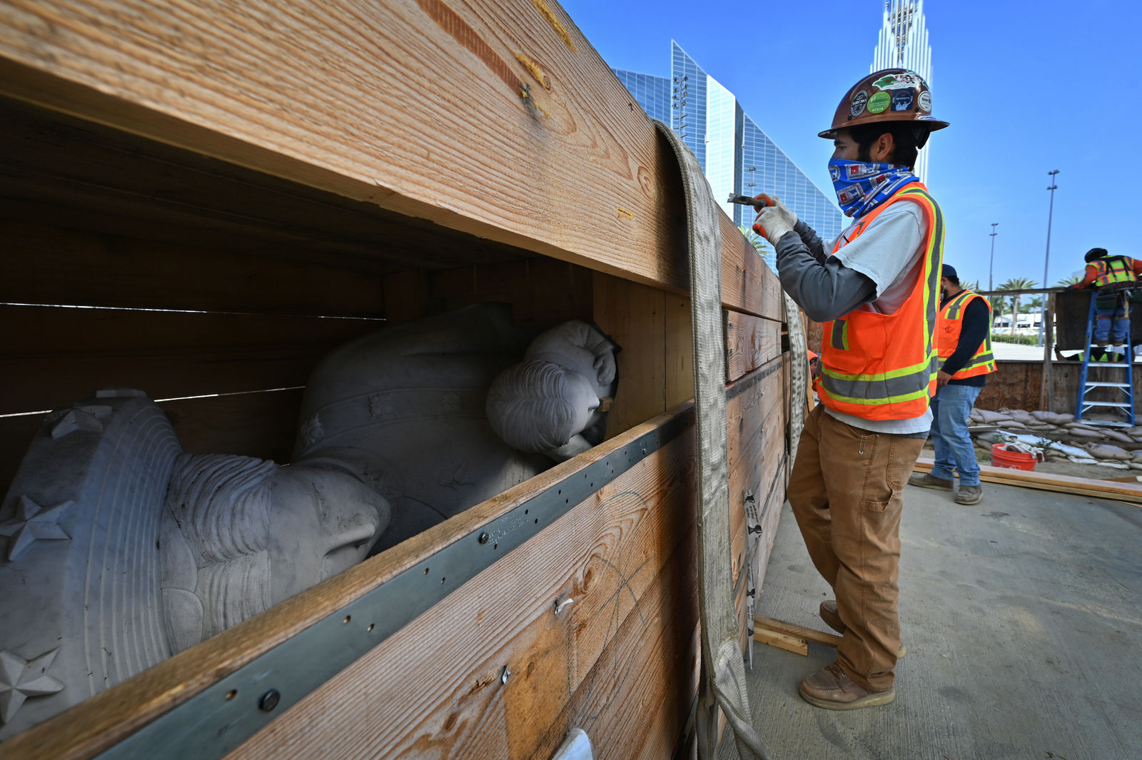Our Lady of La Vang statue is unboxed for installation at Christ Cathedral. Photo courtesy Diocese of Orange. Note: Photo taken during construction.